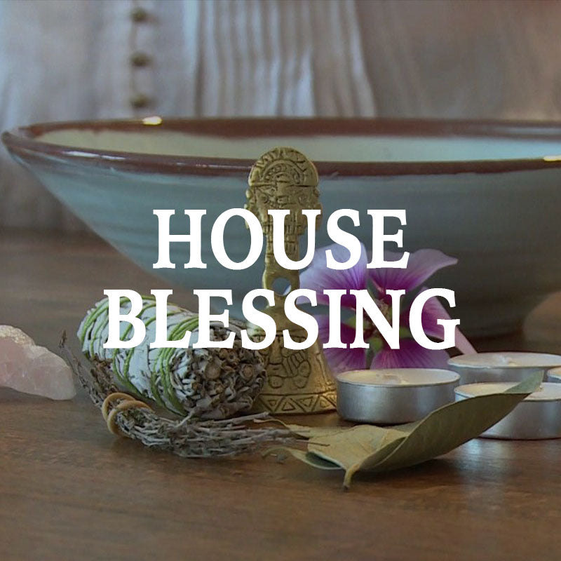 Decorative items for a house blessing on a wooden surface with text overlay.